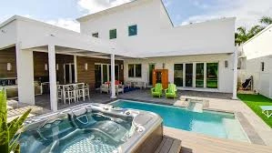 L-Shaped Kitchen Under Compact Pergola