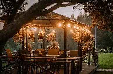 Rustic Wooden Pergola with Stone Counters