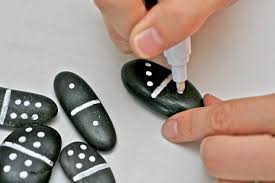 Hand-Painted Dominoes on Rocks