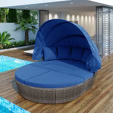 Poolside Wicker Daybed with Blue Cushions