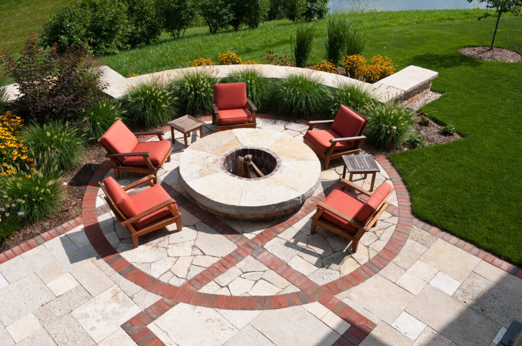 Red Brick Circular Fire Pit with Sculptural Seating Design