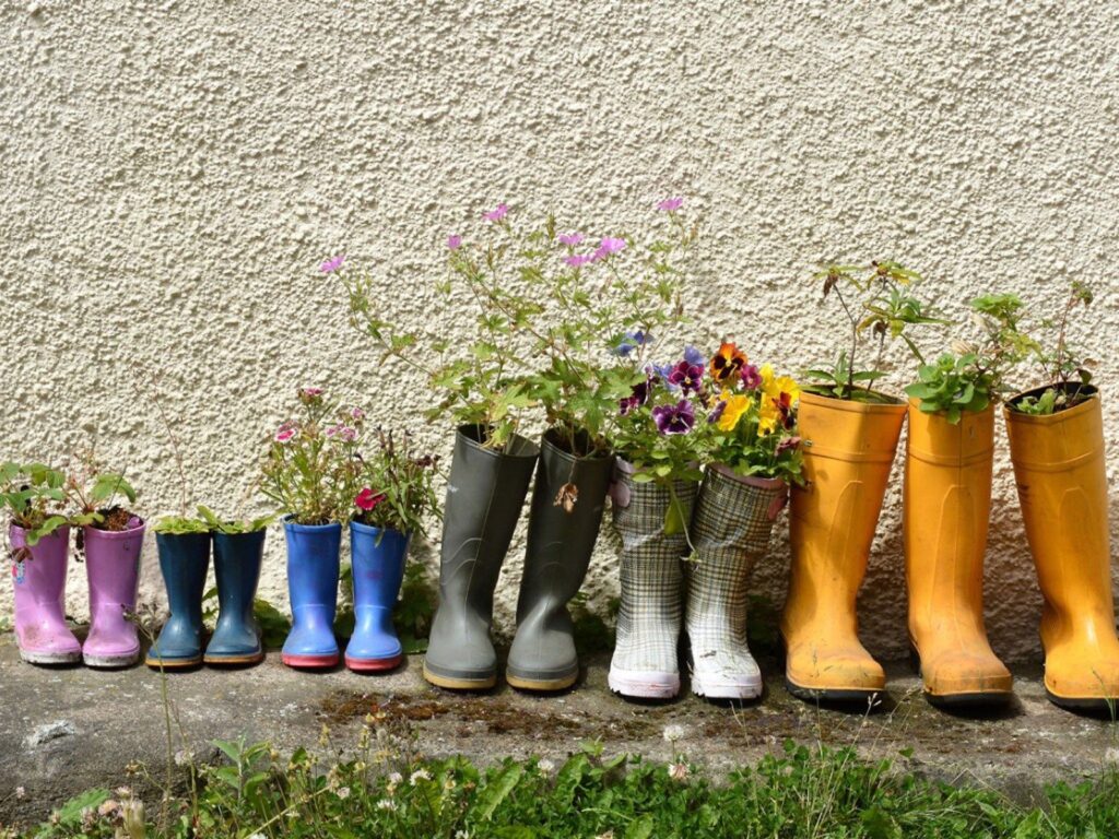 Rain Boot Planters on a Fence